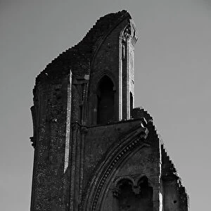Low angle view of historic Glastonbury Abbey against sky, Somerset, UK