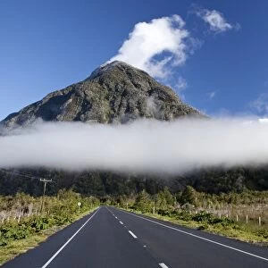 Low-hanging clouds moving through the Patagonian Andes over the Pan-American Highway, Carretera Austral, Ruta CH7, Region de los Lagos, Patagonia, Chaiten, Chile, South America, America