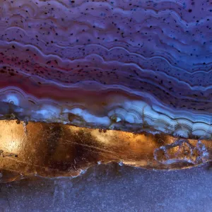 Luxury raw purple Agate Crystal surface texture as a background. Natural pattern surface, Abstract design element of mineral stone macro closeup