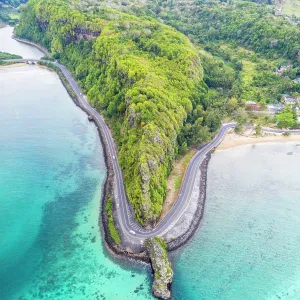 Maconde point along coastal road by the tuquoise sea, Mauritius Maconde point along coastal road by the tuquoise sea, Mauritius