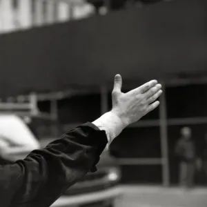 A man hailing a taxi A man hailing a taxi