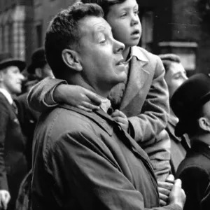 Man Holds Boy Man Holds Boy