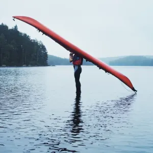 Man with Kayak on Head Print Man with Kayak on Head Print