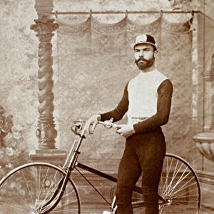 Man Posing with Bicycle