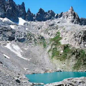 Medium Format Print of Solitary Figure on Alpine Lake Shore Medium Format Print of Solitary Figure on Alpine Lake Shore