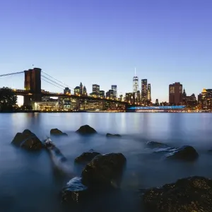 Manhattan skyline at dusk seen from Brooklyn, New York City, USA Manhattan skyline at dusk seen from Brooklyn, New York City, USA