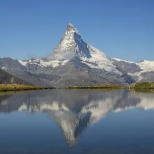 Matterhorn reflected in Stellisee, Zermatt, Valais Canton, Switzerland Matterhorn reflected in Stellisee, Zermatt, Valais Canton, Switzerland