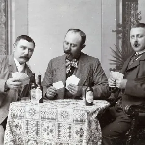 Three men playing cards