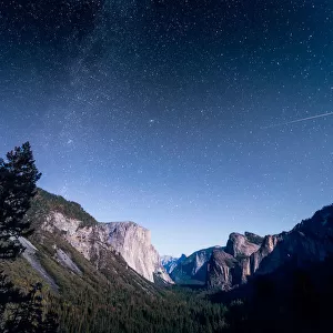 The Milky Way over El Capitan and Half Dome Mountain from Tunnel VIew, Yosemite National Park, California, United States