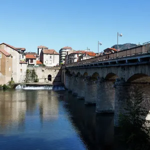 Millau / France - old town and historic bridge crossing Tarn River