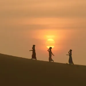 Minority Cham Girls Print on Sand Dune at Dawn Minority Cham Girls Print on Sand Dune at Dawn