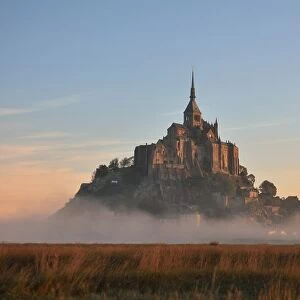 Mont-Saint-Michel Abbey at sunset, Normandy, France