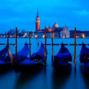 Moored Gondolas and the Island of Saint Giorgio Maggiore at Night Moored Gondolas and the Island of Saint Giorgio Maggiore at Night