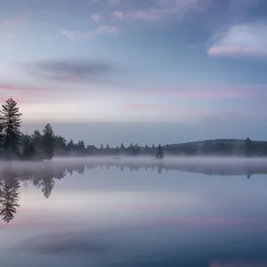 Morning reflections on Lake Durant, Adirondack Mountains, New York State, USA