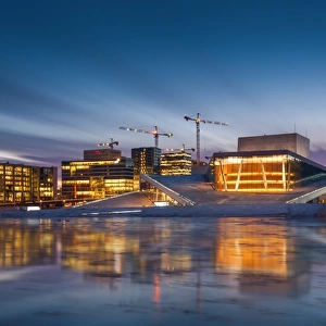 Morning view of Oslo opera house with reflection
