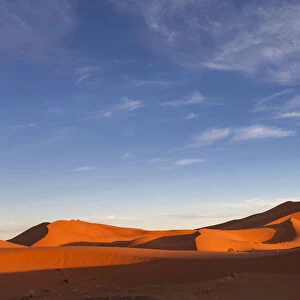 Moroccan desert landscape with blue sky. Dunes background