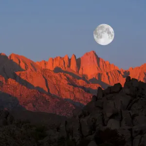 Mount Whitney with full moon at sunrise