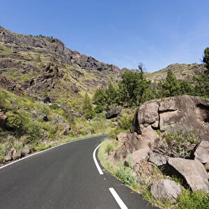 Mountain chain and a country road, El Pie de la Cuesta, Roque Bentaiga, Gran Canaria, Canary Islands, Spain, Europe, PublicGround