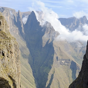 Mountain Pass with sharp peak and low lying cloud in background, Mweni, Drakensberg, Kwazulu Natal, South Africa