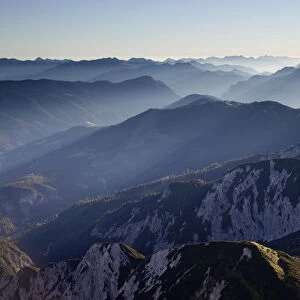Mountain ridges with backlighting, seen from Hochiss Mountain in Rofan, Maurach, Tyrol, Austria
