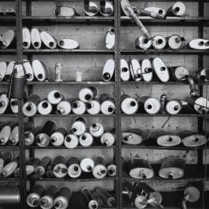 Mufflers on shelves Mufflers on shelves