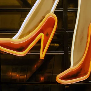 Part of neon light sign, red high heels