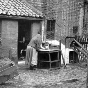 Newcastle Slums Print circa 1910: Woman in Domestic Setting Newcastle Slums Print circa 1910: Woman in Domestic Setting