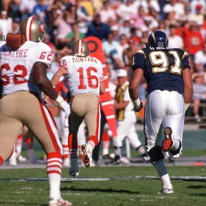 NFL San Francisco 49ers - QB # 16 Joe Montana, RD # 62 Guy McIntyre and S.D. Charger DE # 91 Leslie O'Neal