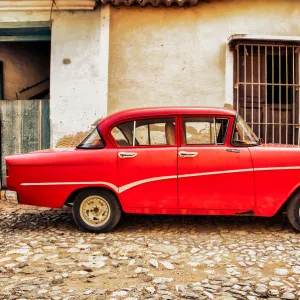 Old classic red car in Cuba