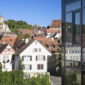 The old town is reflected in the glass facade of a modern building, Schwaebisch Hall, Hohenlohe, Baden-Wuerttemberg, Germany, Europe