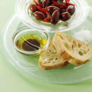 Olives with ciabatta bread and oil for dipping, snacks