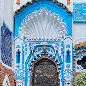 An ornate blue and white doorway in the Blue City of Chefchaouen