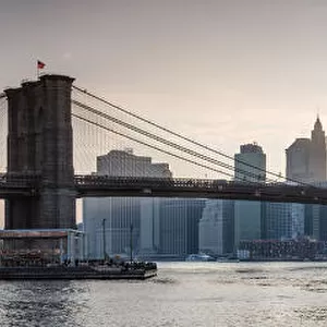 Panoramic: Brooklyn bridge and Manhattan at sunset, New York city