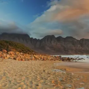 Panoramic Photo of the Bay of Water otherwise known as Kogel Bay with the Kogelberg Mountain Range in the Distance. Western Cape Province, Cape Town, South Africa Panoramic Photo of the Bay of Water otherwise known as Kogel Bay with the Kogelberg Mountain Range in the Distance. Western Cape Province, Cape Town, South Africa