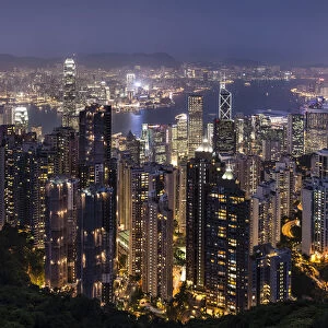 Panoramic view from Victoria Peak across the high-rise buildings at night, Central District, Hong Kong, China