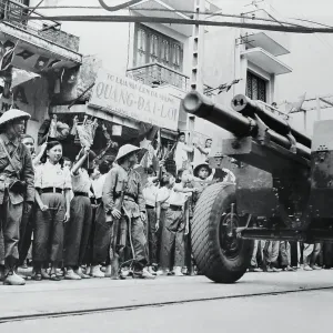 Parade of People and Tank on Street Parade of People and Tank on Street