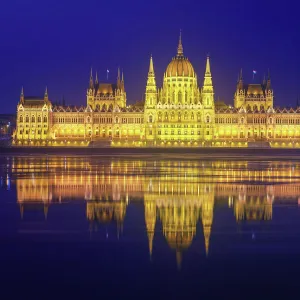 The Parliament of Hungary with the Danube river (Budapest, Hungary) in the night