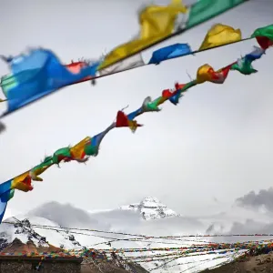 Peak of Mount Everest above clouds Peak of Mount Everest above clouds