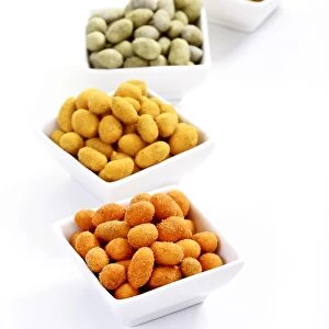 Peanuts in various flavoured coatings, chili, Wasabi, curry and paprika