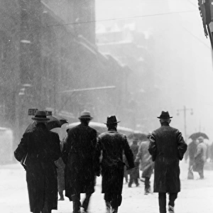 Pedestrians In Winter Snow