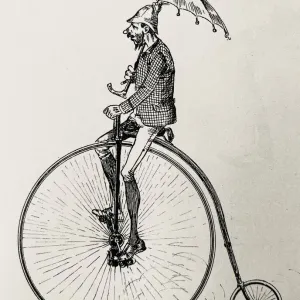 Un cycliste à la pénichette avec parapluie. Un cycliste à la pénichette avec parapluie.