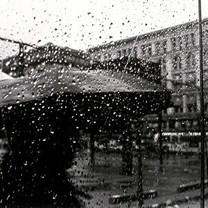 Person with umbrella in rain