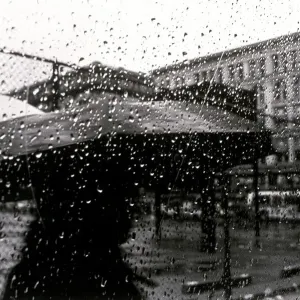 Urban Commute Print with Umbrella in Rain Urban Commute Print with Umbrella in Rain