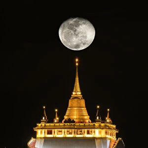 Phu Khao Thong with Big moon at night, Bangkok, Thailand