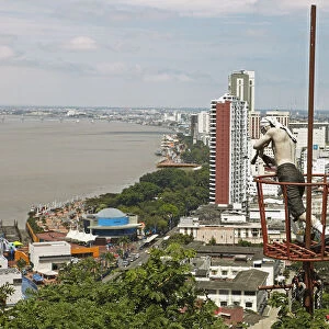 Pirate figure on Cerro Santa Ana looking on Malecon Simon Bolivar with a telescope, Guayaquil, Guayas Province, Ecuador