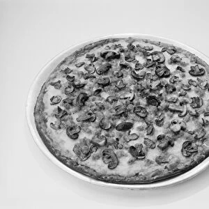 Pizza with mushrooms topping on white background, close-up