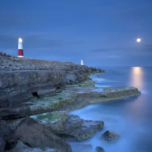 Portland Moonrise Print: The moon rises over the sea at Portland Bill