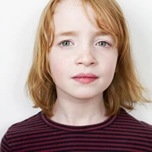 Portrait of a girl with red hair
