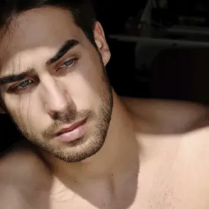 Portrait of a young man in sunlight, beauty shot