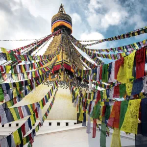 Prayer flags with the Boudhanath Stupa in Kathmandu, Nepal